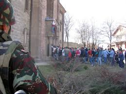 Kosovo NATO watch Albanians destroy Serbian Church