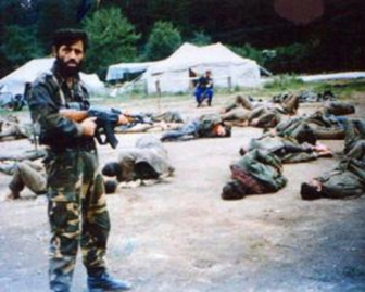 bosnia - muslim soldier with captives on ground