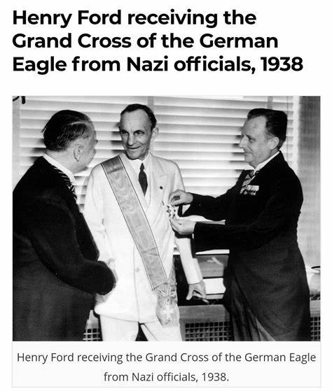 Ford Recieves Iron Cross from Nazi officials